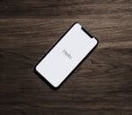 Black Iphone 7 on Brown Table